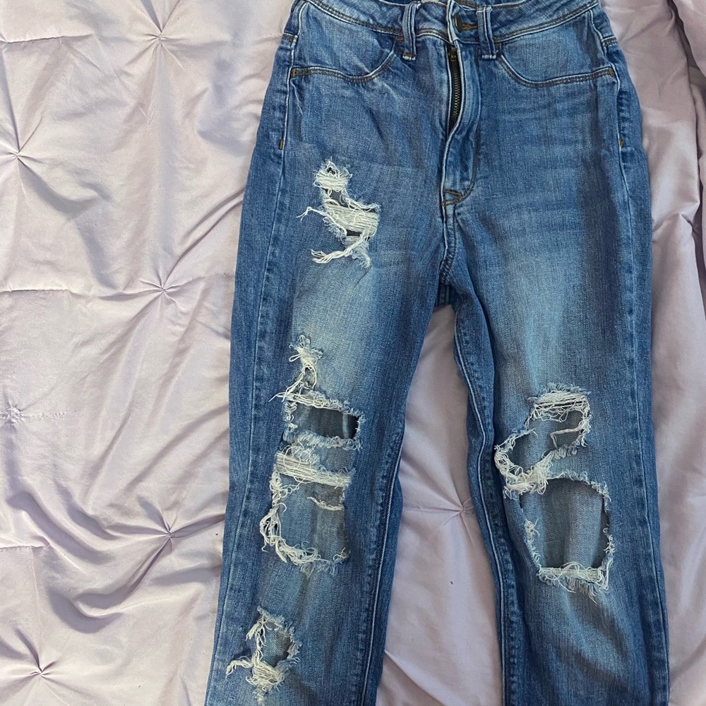 distressed medium blue washed jeans